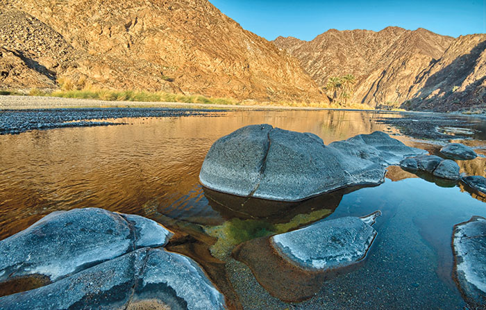 Discovering the Dreamy Beauty of Wadi Al Abyad, Oman image showing main features